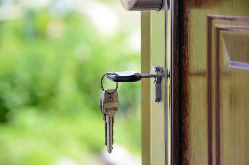 building metal key in house door lock