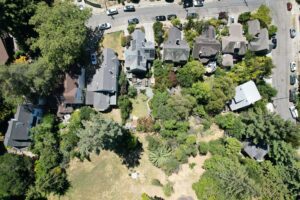 Aerial view of housing development with trees
